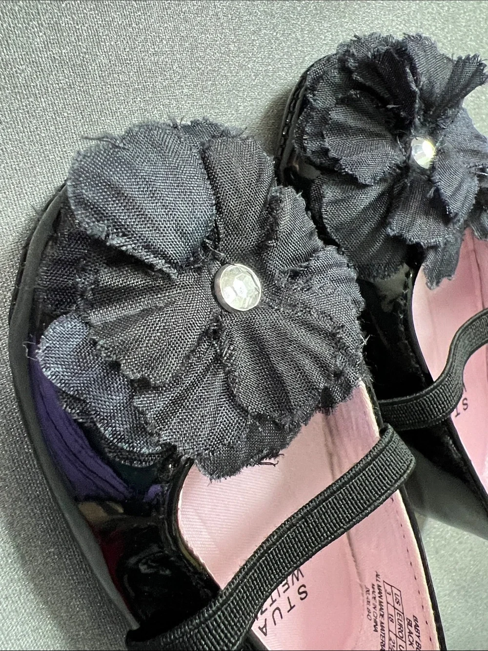 Stuart Weitzman Black Patent Mary Jane Shoes with Flower Accent